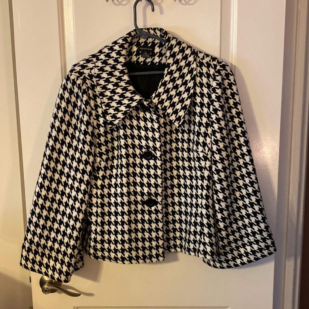 Black and white houndstooth jacket with three buttons